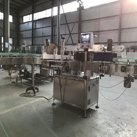 Máy dán nhãn hồ keo tự động