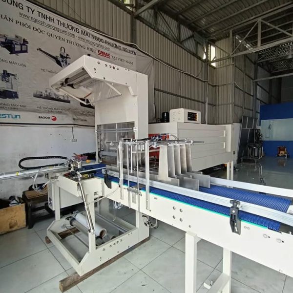 Máy cắt và co màng lốc chai tự động
